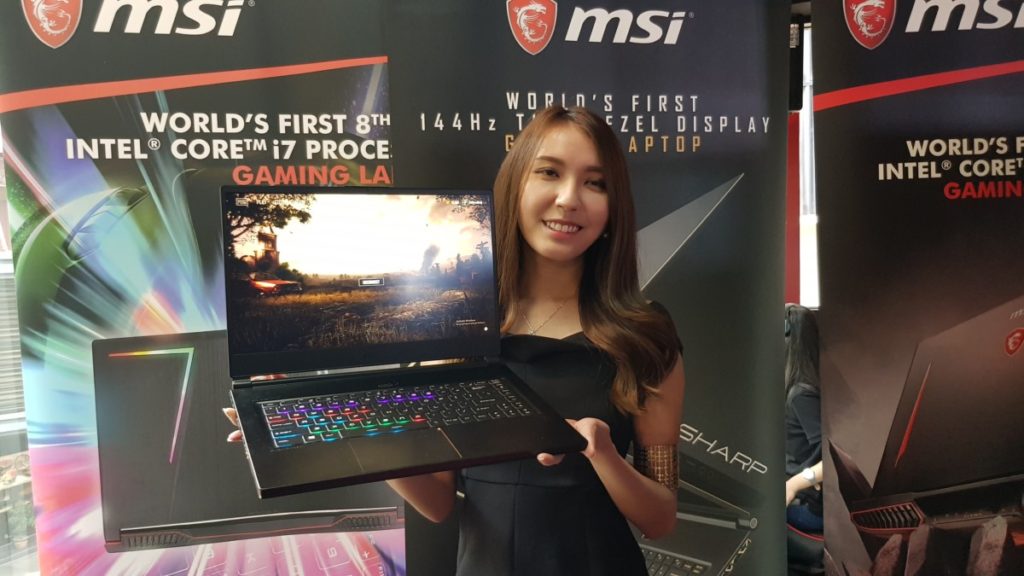 MSI GS65 Stealth Thin held by model