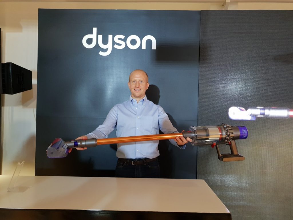 Kevin Grant, Head of Floorcare Category from Dyson showcasing the new Cyclone V10 vacuum cleaner