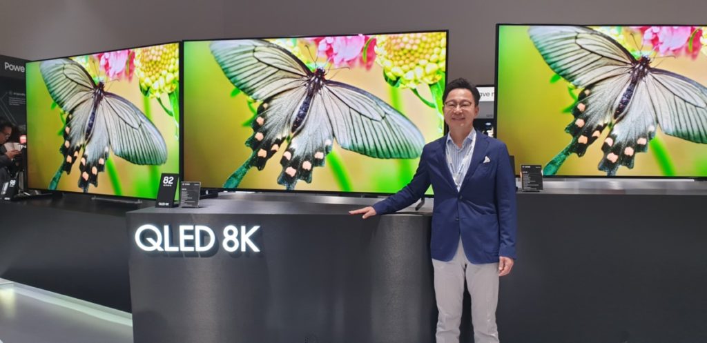 Mr Yoonsoo Kim, Samsung Malaysia Electronics President showcasing the new range of 8K QLED TVs
