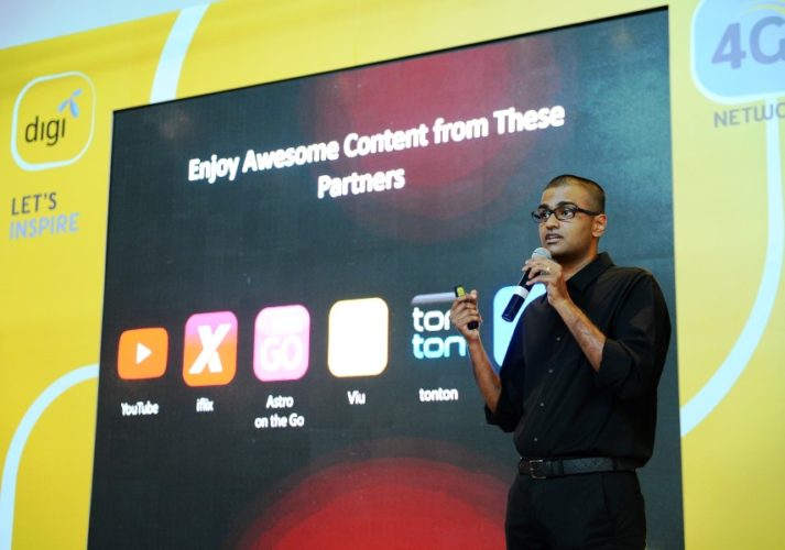 Praveen Rajan Nadarajan, Digi's Head of Postpaid & Digital Services introducing Digi's latest digital service offering, Digi Video Freedom 