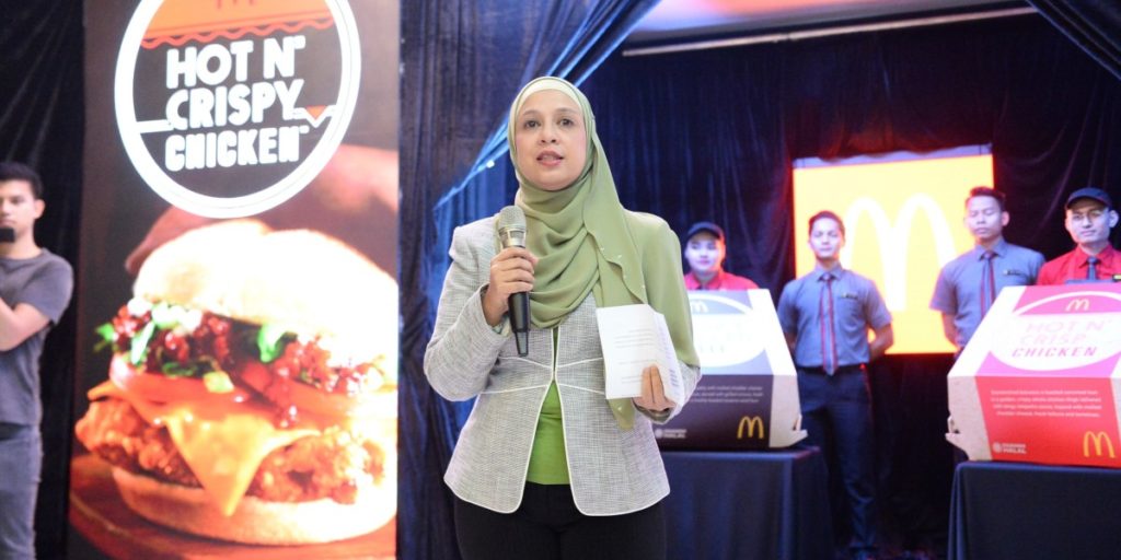 Pn. Melati Abdul Hai giving her speech at the launch of the Smoky Grilled Beef burger and Hot N’ Crispy Chicken burger