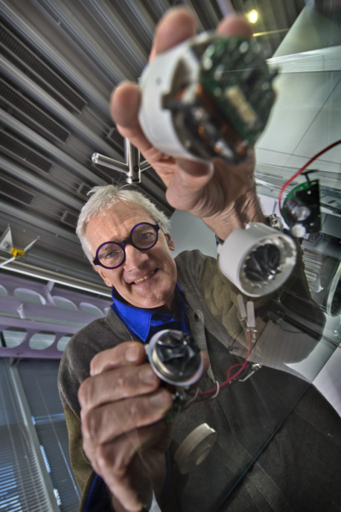 Sir James Dyson with examples of Digital Motors that go into a host of his products