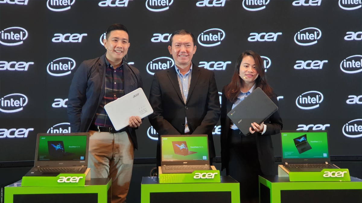 Acer representatives showcasing the latest TravelMate, Chromebook and PD series projector