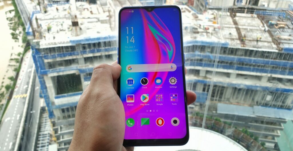 OPPO F11 with hands