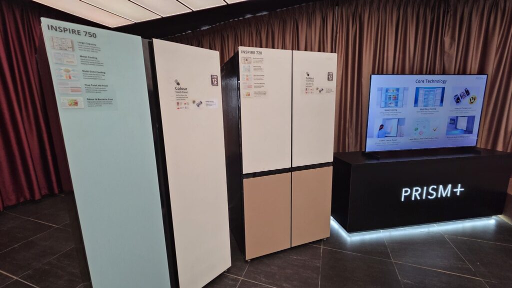 PrismPlus U-series QD Mini-LED TVs cover angled fridges